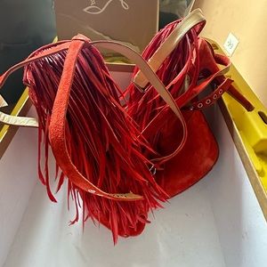 Christian Louboutin tie up shoe.